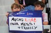 Fans hold a sign in support of Inter Miami forward Lionel Messi, who's father Jorge Messi passed away, before a Leagues Cup soccer match between Inter Miami and Monterrey, Saturday, Aug. 8, 2026, in Miami. (AP Photo/Lynne Sladky)