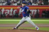 Los Angeles Dodgers pitcher Yoshinobu Yamamoto throws against the Arizona Diamondbacks in the first inning of a baseball game, Saturday, Aug. 8, 2026, in Phoenix. (AP Photo/Rick Scuteri)