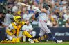 Minnesota Twins' Kody Clemens (2) hits a two-run home run as Milwaukee Brewers catcher Gary Sánchez, center, and umpire Chad Whitson, left, look on during the sixth inning of a baseball game Sunday, Aug. 9, 2026, in Milwaukee. (AP Photo/Kayla Wolf)