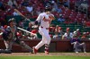 St. Louis Cardinals' JJ Wetherholt, right, watches his two-run double in front of Colorado Rockies catcher Brett Sullivan, left, in the eighth inning of a baseball game, Sunday, Aug. 9, 2026, in St. Louis. (AP Photo/Joe Puetz)