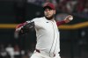 Arizona Diamondbacks pitcher Eduardo Rodriguez throws against the Los Angeles Dodgers in the first inning of a baseball game, Sunday, Aug 9, 2026, in Phoenix. (AP Photo/Rick Scuteri)
