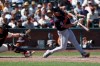 Detroit Tigers' Hao-Yu Lee, right, hits an RBI single in front of San Francisco Giants catcher Drew Cavanaugh, left, during the 10th inning of a baseball game in San Francisco, Sunday, Aug. 9, 2026. (AP Photo/Jed Jacobsohn)