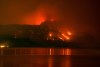 The Bald Range wildfire, that has forced 20,000 people out of their homes in the south Okanagan region, burns in Summerland, B.C., late Saturday, Aug. 8, 2026. THE CANADIAN PRESS/Darryl Dyck