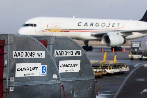 A Cargojet plane sits on the tarmac at the John C. Munro Hamilton International Airport in Hamilton on Friday, Feb. 23, 2024. THE CANADIAN PRESS/Nick Iwanyshyn