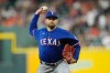 Texas Rangers starting pitcher Nathan Eovaldi throws against the Houston Astros during the first inning of a baseball game Friday, July 31, 2026, in Houston. (AP Photo/David J. Phillip)