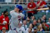 New York Mets' Brett Baty follows through on a grand slam against the Atlanta Braves during the first inning of a baseball game, Monday, Aug. 10, 2026, in Atlanta. (AP Photo/Erik S. Lesser)