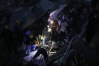 People search through the rubble after an earthquake struck Cali, Colombia, Monday, Aug. 10, 2026. (AP Photo/Santiago Saldarriaga)