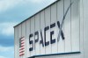 FILE - The SpaceX logo is displayed on a building, May 26, 2020, at the Kennedy Space Center in Cape Canaveral, Fla. (AP Photo/David J. Phillip, File)