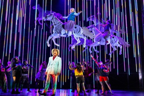This image released by the Scottish Opera shows Justin Austin, foreground center, and Susan Bullock, top center, during a performance of 