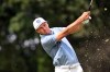 Jordan Spieth hits from the ninth tee during the first round of the Rocket Classic golf tournament at the Detroit Golf Club, Thursday, July 30, 2026, in Detroit. (AP Photo/Jose Juarez)