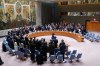 FILE - Participants in a Security Council meeting rise for a moment of silence at United Nations headquarters, Feb. 24, 2023. (AP Photo/Seth Wenig, File)