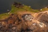 Wildfire damage is pictured from the air in Collins First Nation, a small, remote Ojibwa community located in northwestern Ontario, about 250 km north of Thunder Bay, Ont., on Wednesday, July 22, 2026. THE CANADIAN PRESS/Chris Young