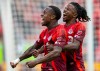 Toronto FC defender Richie Laryea (left) celebrates his goal with teammate Malik Henry in Toronto on Saturday April 18, 2026. THE CANADIAN PRESS/Frank Gunn
