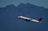 An Air Canada Airbus A220-300 aircraft takes off from Vancouver International Airport, in Richmond, B.C., on Friday, July 31, 2026. THE CANADIAN PRESS/Darryl Dyck