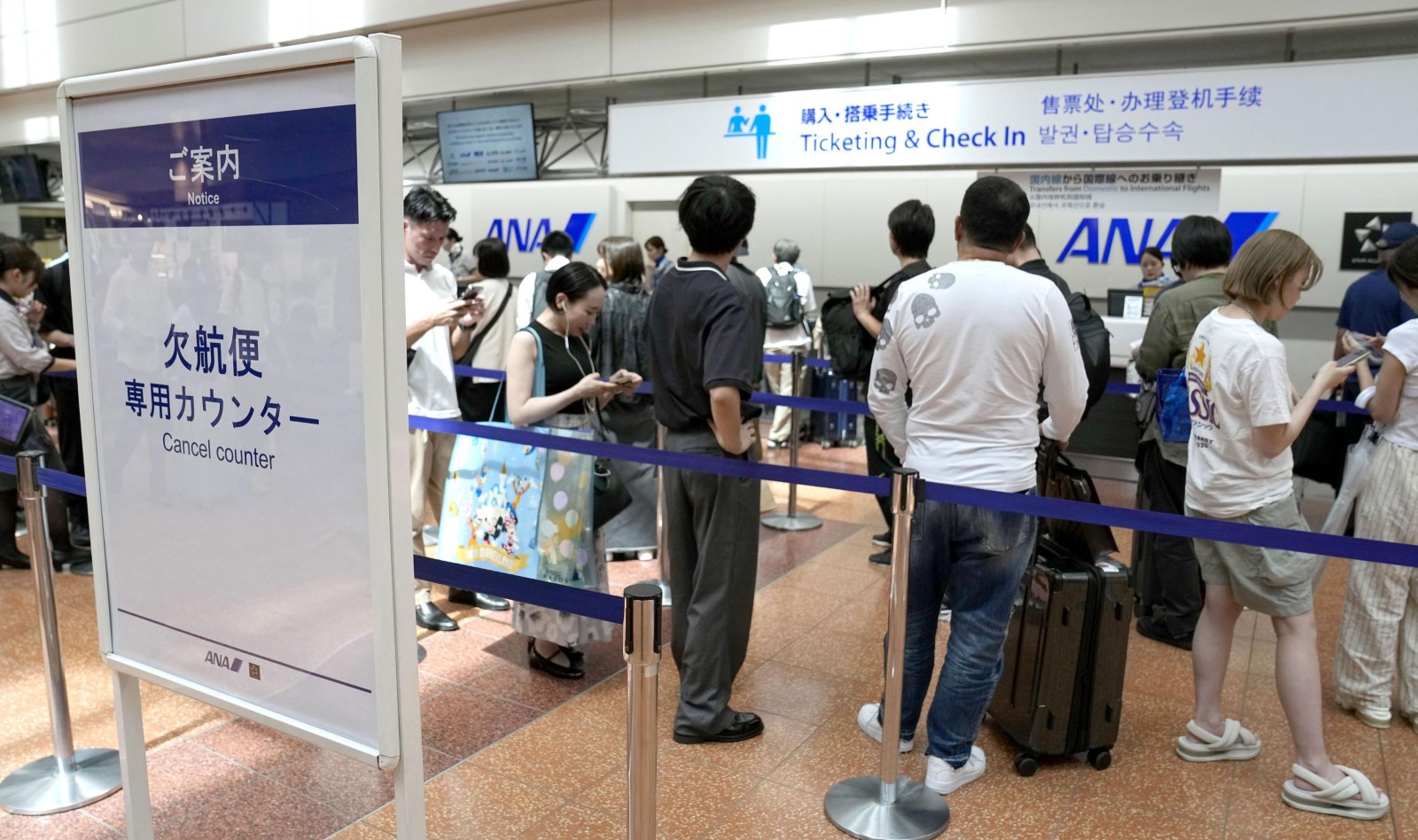 Tropical Storm Chan-hom weakens and departs Japan after causing power outages and injuries