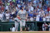 Chicago Cubs' Pete Crow-Armstrong tosses his bat after hitting a home run off of Washington Nationals pitcher Jake Irvin during the third inning of a baseball game, Tuesday, Aug 11, 2026, in Washington. (AP Photo/Terrance Williams)