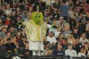 Chicago White Sox mascot Southpaw stands on the dugout wearing a pope outfit during the seventh inning of a baseball game against the Cincinnati Reds, Tuesday, Aug. 11, 2026, in Chicago. (AP Photo/Melissa Tamez)