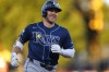 Tampa Bay Rays' Taylor Walls jogs around the bases after hitting a two-run home run during the fourth inning of a baseball game against the Athletics Tuesday, Aug. 11, 2026, in West Sacramento, Calif. (AP Photo/Scott Marshall)
