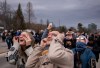 People watch the total solar eclipse in Niagara Falls, Ont., on Monday, April 8, 2024. THE CANADIAN PRESS/Aaron Lynett