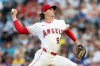 Los Angeles Angels starting pitcher George Klassen works against a Texas Rangers batter in the first inning of a baseball game Wednesday, Aug. 12, 2026, in Anaheim, Calif. (AP Photo/Karl Anderson)