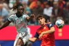 FILE - Belgium's Jeremy Doku (11), left, and Spain's Pau Cubarsi (22) vie for the ball during the World Cup quarterfinal soccer match between Spain and Belgium in Inglewood, Calif., near Los Angeles, Friday, July 10, 2026. (AP Photo/Andre Penner, File)