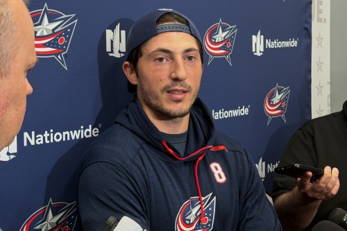Columbus Blue Jackets defenseman Zach Werenski speaks to reporters at Nationwide Arena in Columbus, Ohio, on Thursday, Aug. 13, 2025. (AP Photo/Joe Reedy)