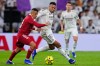 Real Madrid's Kylian Mbappe, right, vies for the b all with Sevilla's Alexis Sanchez during the Spanish La Liga soccer match between Real Madrid and Sevilla in Madrid, Spain, Saturday, Dec. 20, 2025. (AP Photo/Manu Fernandez)