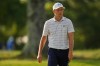 Jordan Spieth walks across the first green during the first round of the St. Jude Championship golf tournament Thursday, Aug. 13, 2026, in Memphis, Tenn. (AP Photo/George Walker IV)