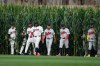 Players walk onto the field before a baseball game between the Minnesota Twins and the Philadelphia Phillies at the Field of Dreams movie site, Thursday, Aug. 13, 2026, in Dyersville, Iowa. (AP Photo/Charlie Neibergall)