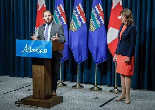 Alberta Education Minister Demetrios Nicolaides, left, and Premier Danielle Smith provide an update on teacher bargaining in Calgary, on Friday, Oct. 17, 2025. THE CANADIAN PRESS/Jeff McIntosh