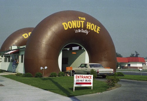 FILE - A drive-thru coffee and donut shop the Donut Hole is seen in Los Angeles in November 1970. (AP Photo/David F. Smith, File)