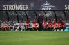 Vancouver Rise FC head coach Anja Heiner-Moller watches play during a NSL match against Toronto AFC in Burnaby, British Columbia, Sunday, June 28, 2026. (AP Photo/Abbie Parr)