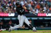 Chicago White Sox's Miguel Vargas hits a two-run home run against the Detroit Tigers during the sixth inning of a baseball game Friday, Aug. 14, 2026, in Detroit. (AP Photo/Paul Sancya)
