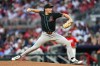 Arizona Diamondbacks pitcher Brandon Pfaadt delivers in the third inning of a baseball game against the Atlanta Braves, Friday, Aug. 14, 2026, in Atlanta. (AP Photo/Colin Hubbard)