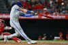 Kansas City Royals' Jac Caglianone hits a two-run home run during the fifth inning of a baseball game against the Los Angeles Angels, Friday, Aug. 14, 2026, in Anaheim, Calif. (AP Photo/William Liang)