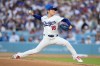 Los Angeles Dodgers starting pitcher Yoshinobu Yamamoto throws to the plate during the first inning of a baseball game against the Milwaukee Brewers, Friday, Aug. 14, 2026, in Los Angeles. (AP Photo/Mark J. Terrill)