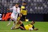 FILE - Union SG's Charles Vanhoutte, right, and Union SG's Anan Khalaili, center, fight for the ball against Glimt's Philip Zinckernagel during the Europa League opening phase soccer match between Union SG and Bodo/Glimt at the King Baudouin stadium in Brussels, on Oct. 3, 2024. (AP Photo/Geert Vanden Wijngaert, File)