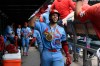 St. Louis Cardinals' Joshua Baez (22) celebrates with teammates in the dugout after hitting a solo home run during the fourth inning of a baseball game against the Chicago Cubs in Chicago, Saturday, Aug. 15, 2026. (AP Photo/Paul Beaty)