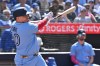 Toronto Blue Jays catcher Alejandro Kirk (30) hits an RBI single against the New York Yankees during third inning MLB baseball action in Toronto on Saturday, Aug. 15, 2026. THE CANADIAN PRESS/Jon Blacker