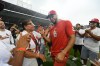 St. Louis Cardinals' Joshua Baez, right, celebrates with his mother Yris Carmen Baez, left, after defeating the Chicago Cubs in a baseball game in Chicago, Saturday, Aug. 15, 2026. (AP Photo/Paul Beaty)