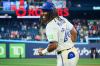 Toronto Blue Jays' Charles McAdoo (26) reacts as he is doused with a sports drink after the Toronto Blue jays defeated the Boston Red Sox in MLB baseball action in Toronto, on Monday, Aug. 10, 2026. THE CANADIAN PRESS/Sammy Kogan