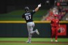 Miami Marlins' Jakob Marsee celebrates as he rounds the bases after a solo home run during the third inning of a baseball game against the Cincinnati Reds on Saturday, Aug. 15, 2026 in Cincinnati. (AP Photo/Tanner Pearson)