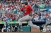 Arizona Diamondbacks third baseman Nolan Arenado (28) follows through on an RBI grounder against the Atlanta Braves during the second inning of a baseball game, Saturday, August 15, 2026, in Atlanta. (AP Photo/Erik S. Lesser)