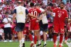 Munich's Jamal Musiala, center, leaves the pitch due to an injury during a pre-season soccer match between FC Bayern Munich and RB Leipzig in Munich, Germany, Saturday, Aug. 15, 2026. (Karl-Josef Hildenbrand/dpa via AP)