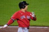 Boston Red Sox's Masataka Yoshida singles off Pittsburgh Pirates pitcher Kirby Yates, driving in a run, during the ninth inning of a baseball game in Pittsburgh, Friday, Aug. 14, 2026. (AP Photo/Gene J. Puskar)