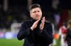 FILE - Monaco's then head coach Sebastien Pocognoli applauds after the Champions League opening phase soccer match between Monaco and Juventus in Monaco, Wednesday, Jan. 28, 2026. (AP Photo/Philippe Magoni, File)