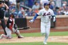 New York Mets' Luis Torrens (13) watches his home run during the fourth inning of a baseball game against the Washington Nationals, Sunday, Aug. 16, 2026, in New York. (AP Photo/Heather Khalifa)
