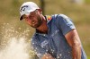 Sam Burns hits from a bunker on the 13th hole during the final round of the St. Jude Championship golf tournament, Sunday, Aug. 16, 2026, in Memphis, Tenn. (AP Photo/George Walker IV)