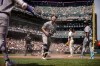 Colorado Rockies' Zac Veen, center, celebrates after he scored on a wild pitch in the sixth inning of a baseball game against the San Francisco Giants in San Francisco, Sunday, Aug. 16, 2026. (Carlos Avila Gonzalez/San Francisco Chronicle via AP)