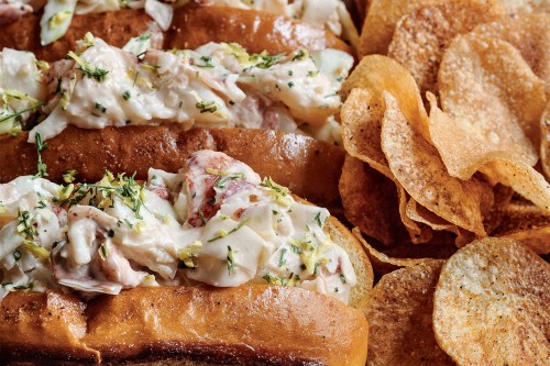 This image released by Voracious shows a recipe for lobster rolls from the cookbook 